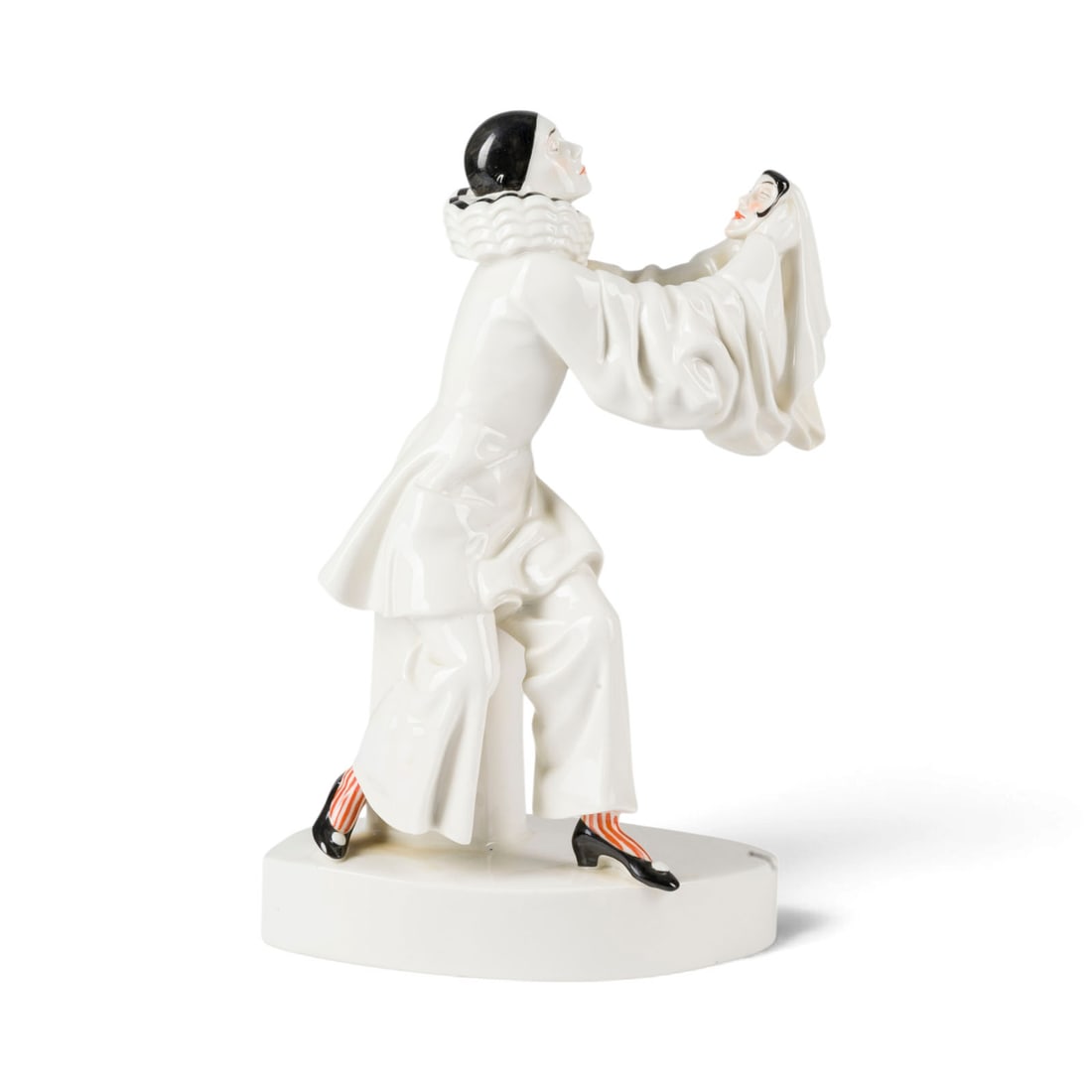 DOROTHEA CHAROL | BAJAZZO MIT MASKE: DOROTHEA CHAROL 1895 Odessa - 1963 London BAJAZZO MIT MASKE Deutsch, Schwarzburger Werkstaetten, 20. Jh. (Entwurf 1919/20) Weissporzellan, glasiert, dezente polychrome Malerei. H. 32 cm.
