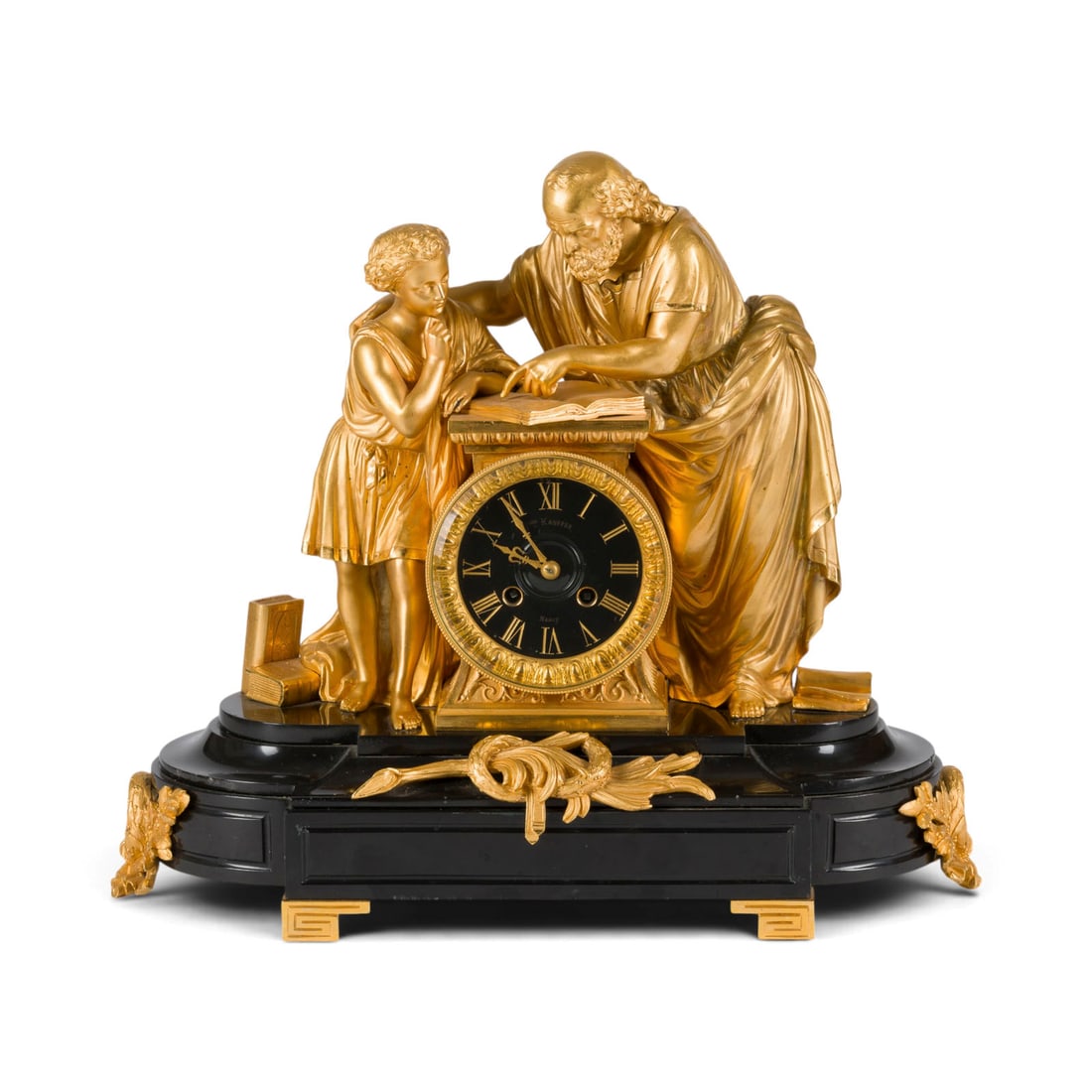 | FIGURENPENDULE 'DER UNTERRICHT': FIGURATIVE PENDULUM CLOCK 'THE LESSON' France, Nancy, Ferdinand Kauffer (1852-1891), circa 1880 Bronze, gilt, marble, glass, metal, steel. 38 x 45 x 17 cm. Inscribed on the dial 'F. and Kauffer Nancy'
