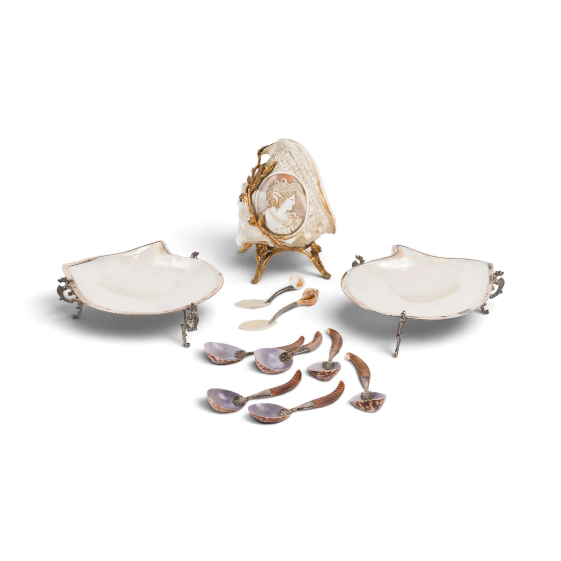 | 11-TEILIGE SAMMLUNG KUNSTKAMMER-OBJEKTE: 11-PIECE COLLECTION OF ART CHAMBER OBJECTS Late 19th century Various shells, giant snail, silver or silver-plated, metal. 21 x 14 x 14 cm / 6 x 21 x 20 cm (shells) / L. 12-14.5 cm (spoons). Some piece