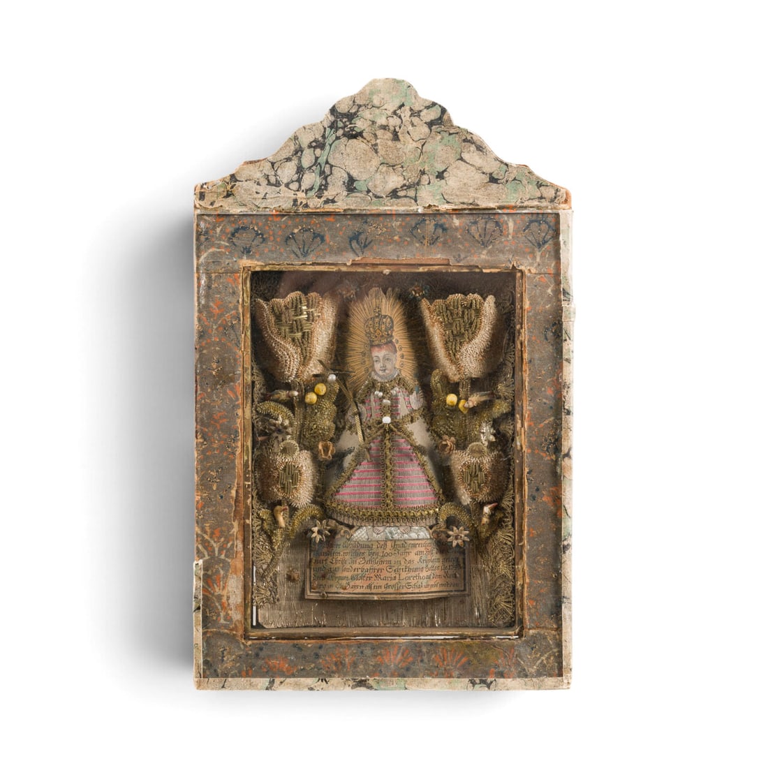 | SAMMLUNG AUS 7 KLOSTERARBEITEN UND DEVOTIONALIEN: COLLECTION OF 7 MONASTIC CRAFT PIECES AND DEVOTIONAL OBJECTS 18th and 19th centuries Various techniques; each framed behind glass. Max. frame dimensions 30 x 29.5 x 4 cm; min. frame dimensions 8.5 x