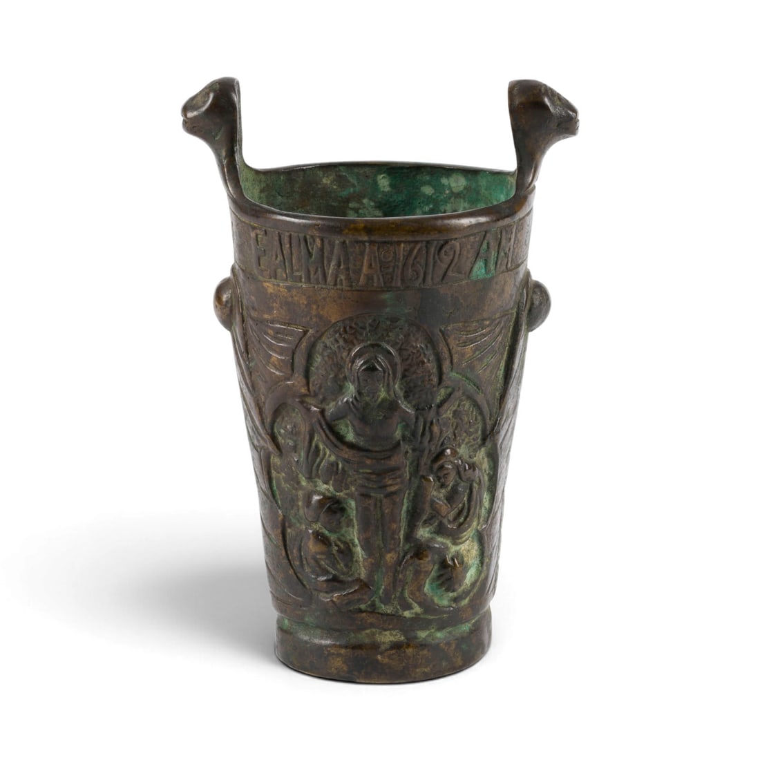 | WEIHWASSER-GEFAeSS IM GOTISCHEN STIL: GOTHIC-STYLE HOLY WATER STOOP Dated '1612' Bronze. 21 x 13.5 x 10.5 cm. Conical body with stylized animal-head handles. Relief decoration encircling the body featuring a depiction of Christ and the