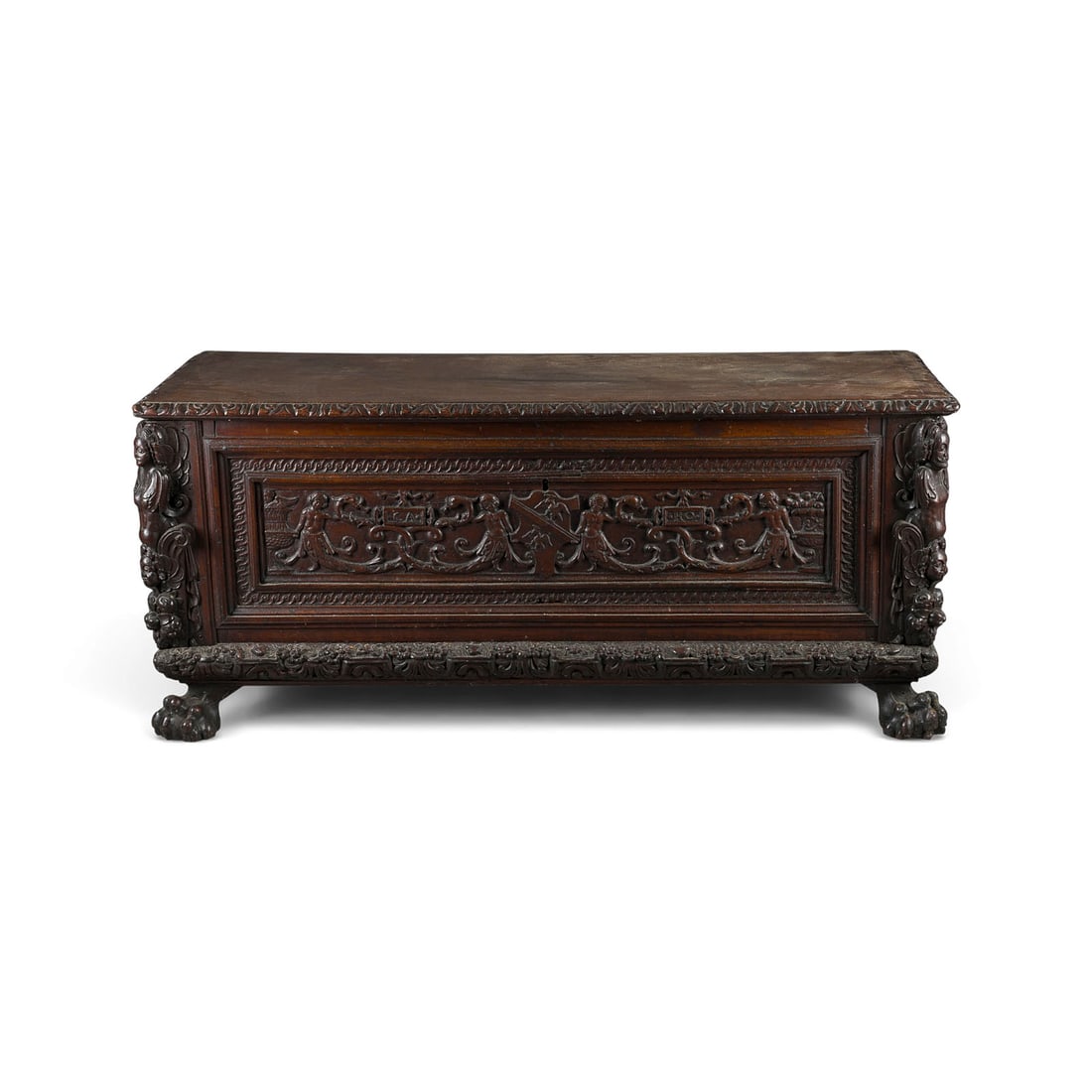 | CASSONE / HOCHZEITSTRUHE: CASSONE / WEDDING CHEST Italy, around 1600 Solid oak, elaborate figurative carvings, iron handles on the sides, hinged lid. H. 67, W. 150, D. 53 cm. 'CA' and 'RO' on the front. Rectangular body on fou