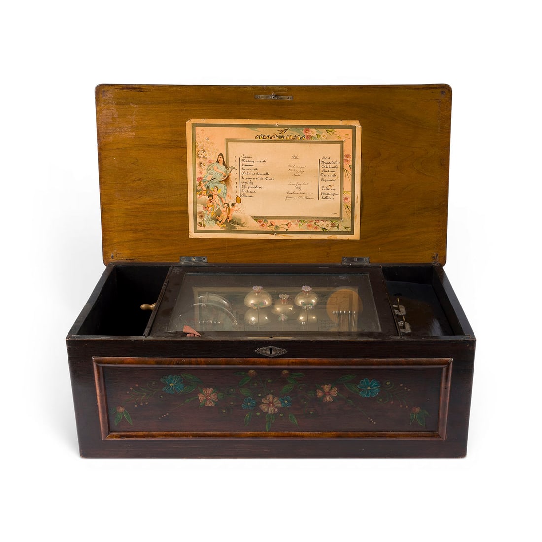 | GROSSE ORCHESTRION WALZENSPIELDOSE MIT TROMMEL, GLOCKEN UND KASTAGNETTEN: LARGE ORCHESTRION CYLINDER MUSIC BOX WITH DRUM, BELLS, AND CASTANETS Switzerland, Sainte-Croix, c. 1885-1895 Rectangular fine-wood case featuring elaborate musical instrument marquetry on the lid and 