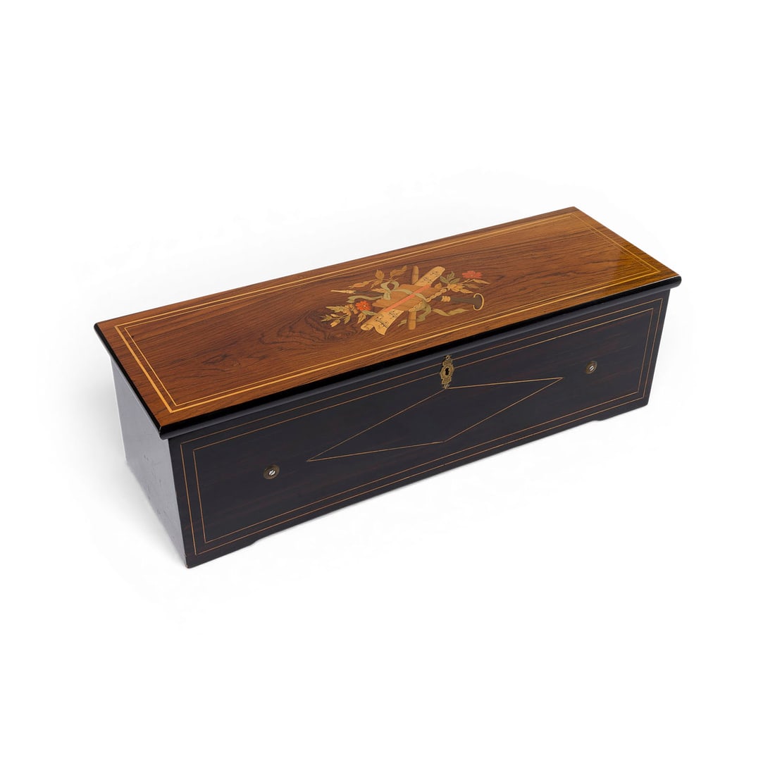 | GROSSE WALZENSPIELDOSE MIT TROMMEL UND GLOCKEN: LARGE CYLINDER MUSIC BOX WITH DRUM AND BELLS Switzerland, circa 1870-1880 Rectangular case featuring fine polychrome musical instrument marquetry on the lid; internal glass dust cover; spring-driven c