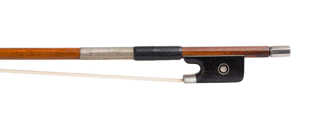 | VIOLINBOGEN: VIOLIN BOW German, early 20th century. Octagonal shaft, Parisian eye, nickel silver mountings, thumb leather, winding, ivory frog. Length 73.6 cm, weight 61 cm. Violin bow unmarked, likely a Pfretzsch