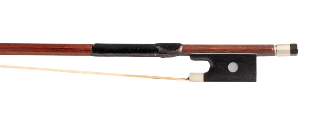 | ZWEI VIOLINBOeGEN: TWO VIOLIN BOWS German, early 20th century. Round and octagonal sticks, simple eye, ivory headplate. Lengths 73.5 and 74.5 cm. Violin bow unmarked. Minor damage. CITES marketing certificate is