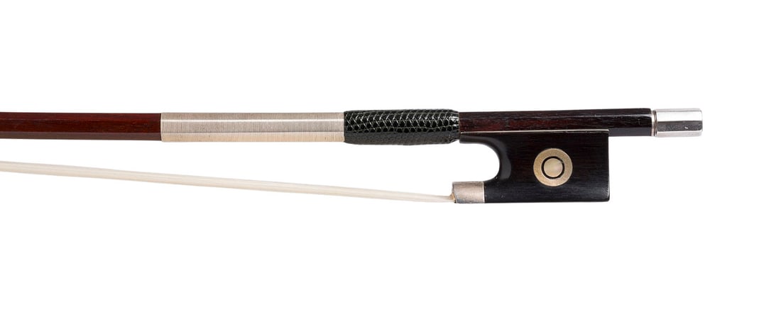 | VIOLINBOGEN GEMARKT 'LOWENDALLS': VIOLIN BOW MARKED 'LOWENDALLS' German, early 20th century. Round, gradually transitioning to octagonal shaft, Parisian eye, silver mountings, winding, thumb leather, ivory frog. Length 74.4 cm, weight