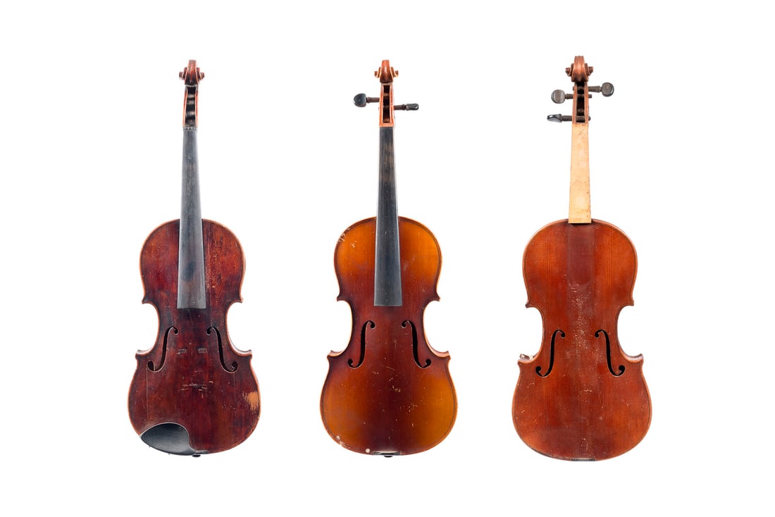 | KONVOLUT VON DREI VIOLINEN: SET OF THREE VIOLINS 19th/20th century Spruce top and maple back, light and brown varnish. 4/4 size; lengths 58.5, 60, and 59.5 cm. Unlabeled. Partially bumped and damaged; one missing the fingerboard