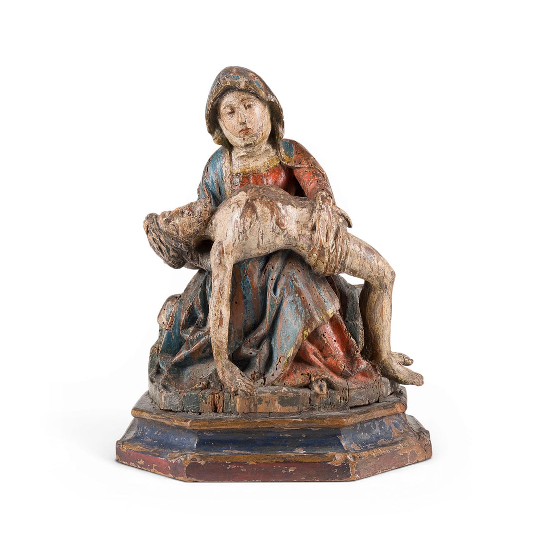 | RHEINISCHE PIETA: RHINELAND PIETA Rhineland, late 15th century Walnut, carved in the round, polychromed and gilded, flattened at the back. H. 32, W. 24, D. 14 cm; weight approx. 1.78 kg. Minor chips and damage; losses 