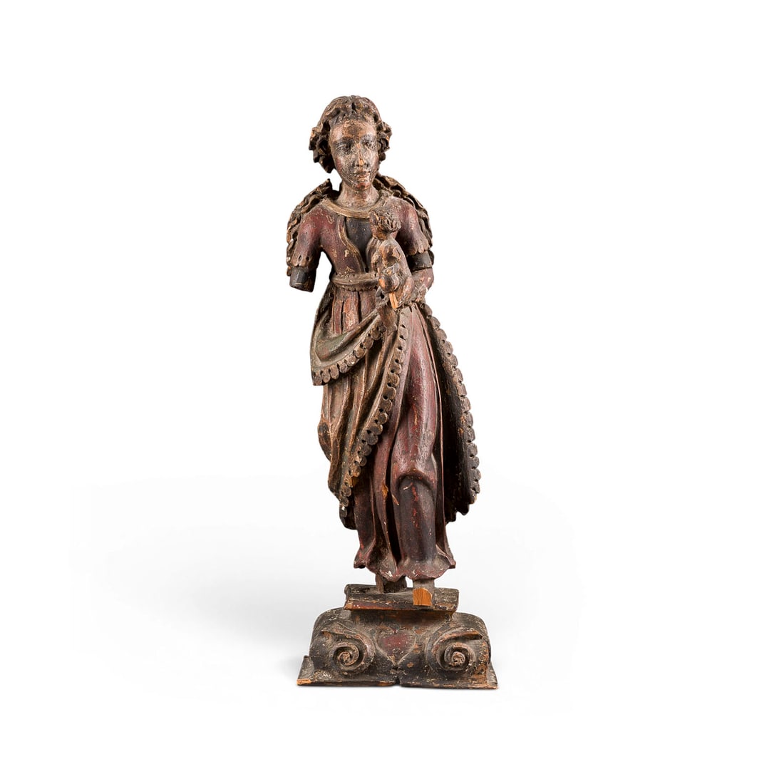 | GOTTESMUTTER MIT DEM CHRISTUSKIND: MOTHER OF GOD WITH THE CHRIST CHILD Spain, 17th century Wood, sculpted, rest. of a frame, flattened on the back, on a pedestal. H. 54, W. 19, D. 11 cm, weight approx. 1.29 kg. Partially intact and dam