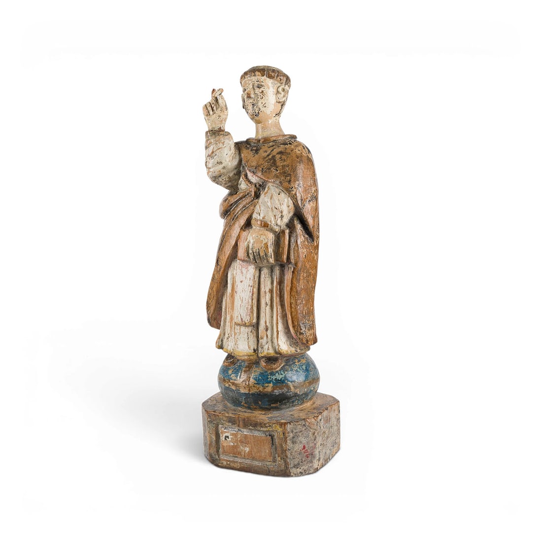 | HEILIGER ORDENSMANN MIT BUCH: SAINTED RELIGIOUS FIGURE WITH BOOK South German, 18th century Wood, carved in the round, polychromed and gilded; mounted on a base, flat-backed. H. 55, W. 18, D. 16 cm. Standing figure of a young sain