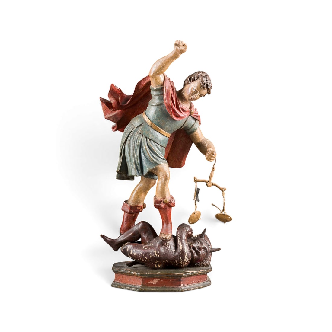 | HEILIGER MICHAEL MIT WAAGE: SAINT MICHAEL WITH SCALES South German, late 17th century Wood, carved in the round, polychrome finish, on a base. H. 37, W. 18, D. 15 cm, weight approx. 1 kg. Partial losses to finish and minor damag