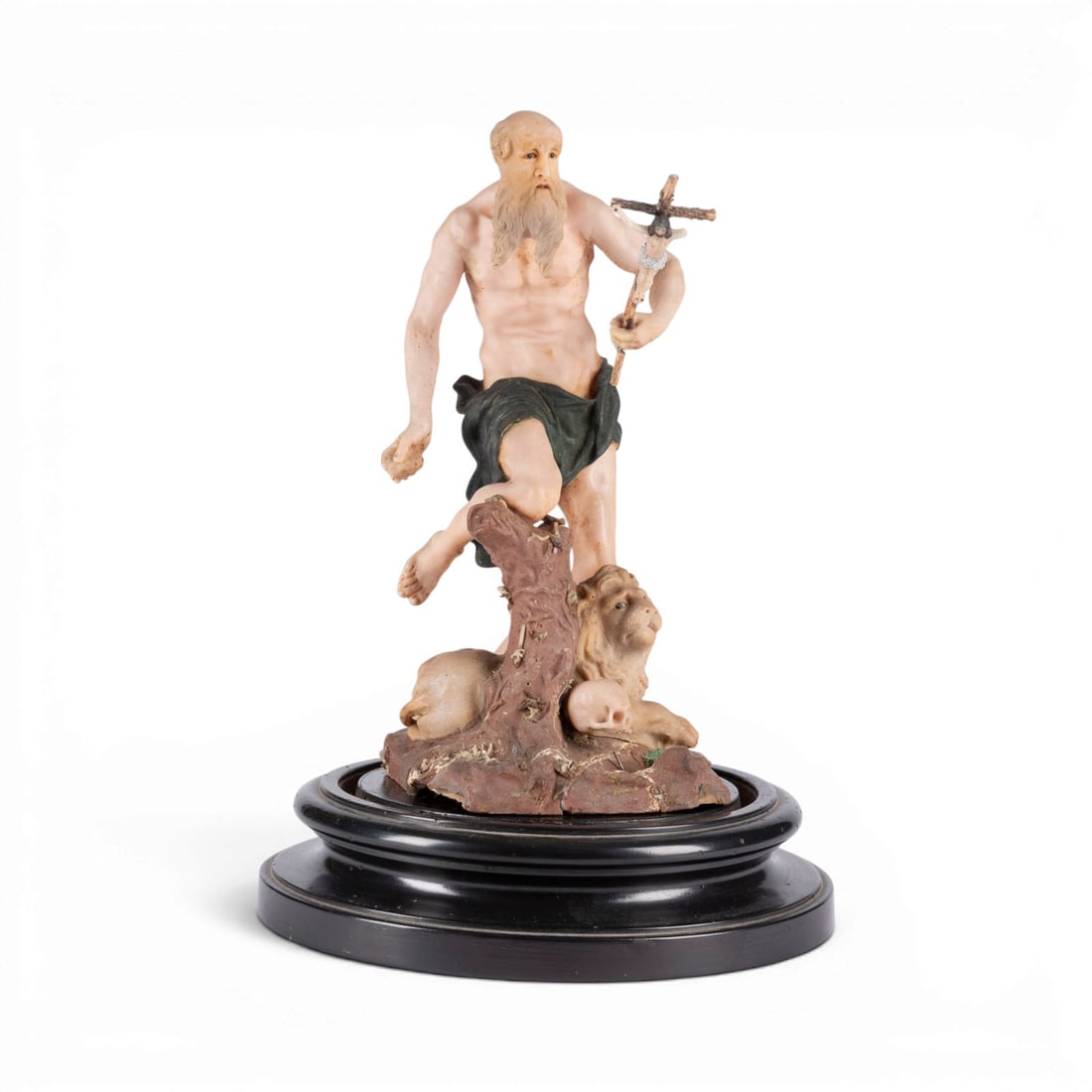 | HEILIGER HIERONYMUS ALS BUeSSER: SAINT JEROME AS A PENITENT German, 18th century Hollow-cast wax, polychrome finish and detailing; with glass dome. Height 43 cm (figure 24 cm). Finely modeled depiction of Saint Jerome as a penitent i