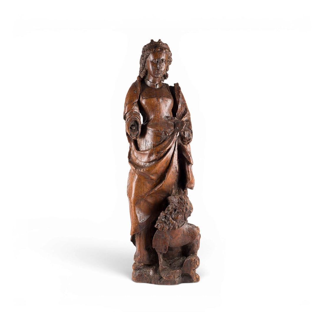 | HEILIGE KATHARINA VON ALEXANDRIEN: SAINT CATHERINE OF ALEXANDRIA Flemish or Lower Rhenish, 16th century Oak, carved in the round, dark-stained, flattened at the back. H. 100, W. 31, D. 16 cm. Depiction of Saint Catherine of Alexandria 