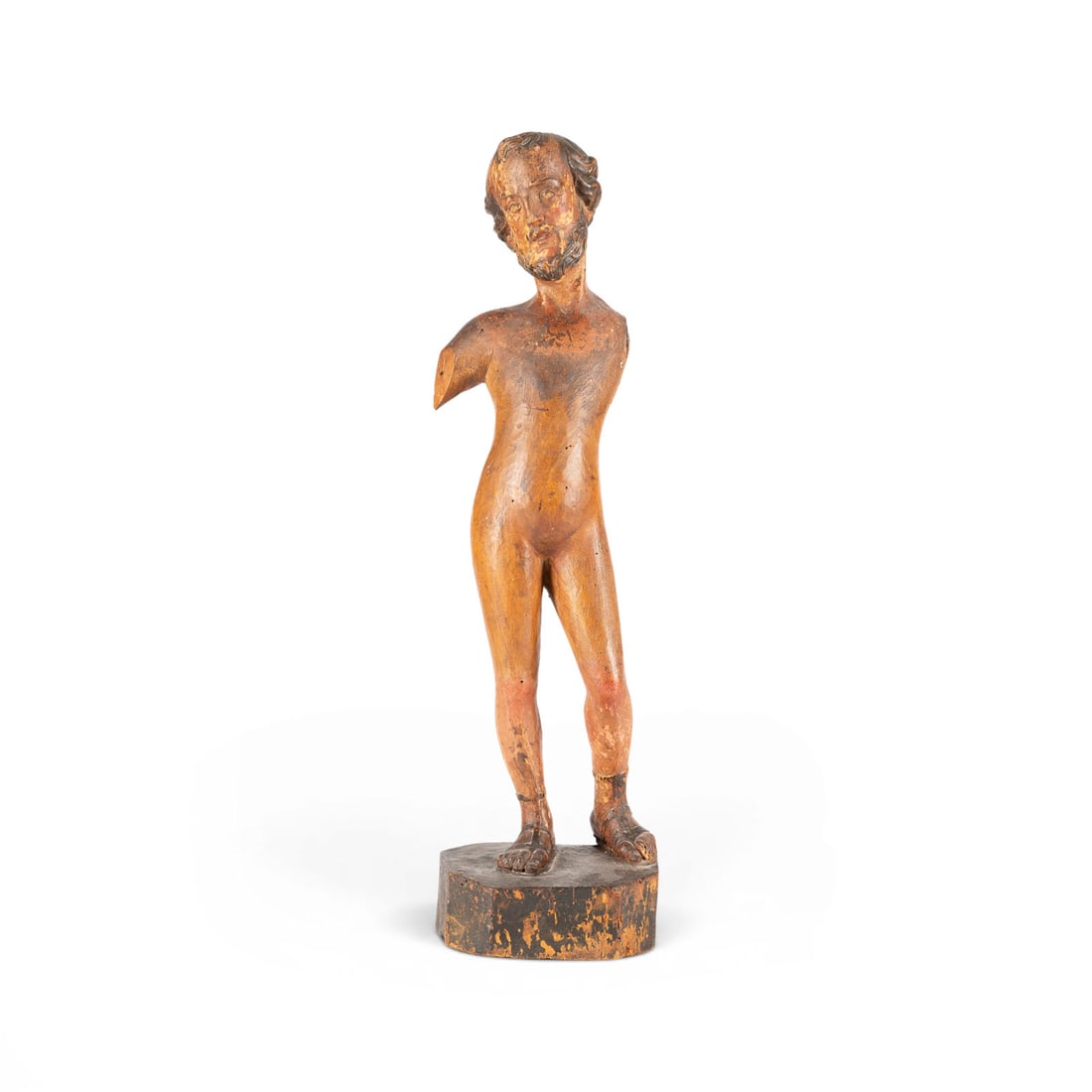 | HEILIGER SEBASTIAN: SAINT SEBASTIAN Germany or Austria, c. 1750 Softwood, carved in the round, traces of polychromy, on a base. H. 56, W. 16, D. 12.5 cm. Depiction of Saint Sebastian as a largely unclothed male nude in a