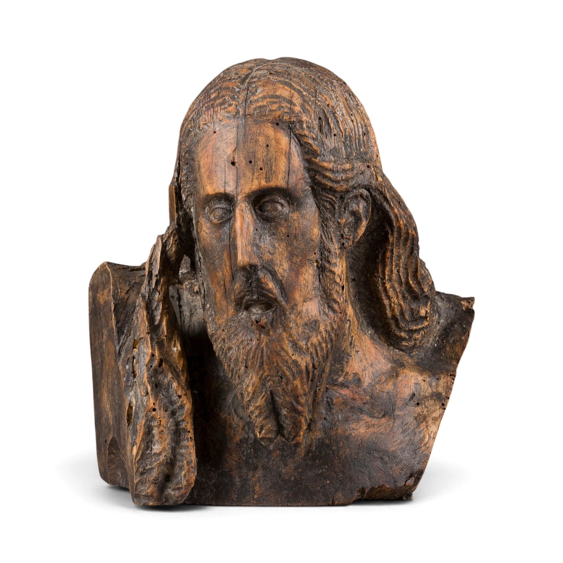 | BUeSTE CHRISTUS: BUST OF CHRIST Flanders, 15th century. Oak, sculpted, stained dark. H. 22, W. 20, D. 13.5 cm, weight approx. 1.64 kg. Devotional bust of Christ with finely crafted facial features, calm, contemplative