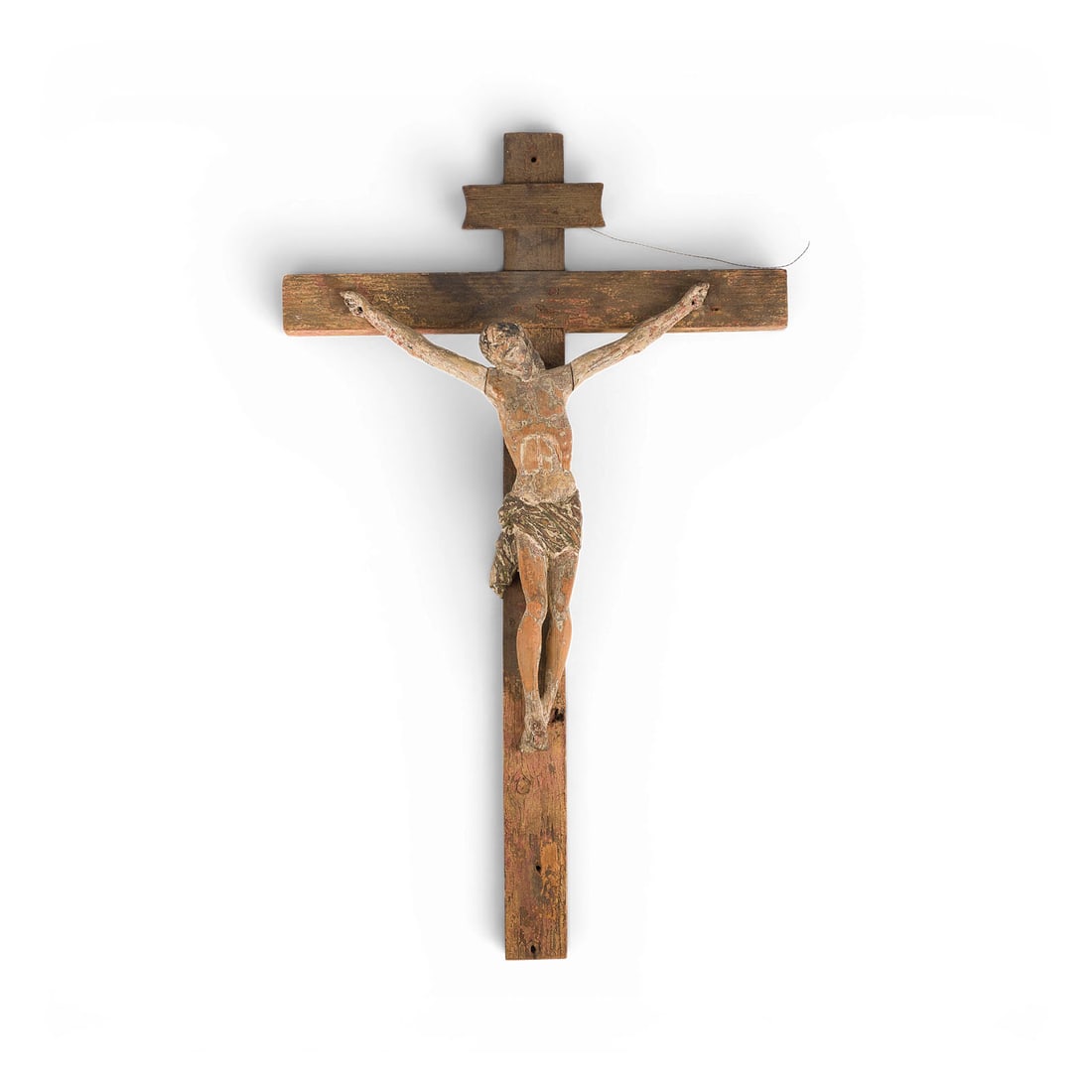 | SPAeTGOTISCHES KRUZIFIX: LATE GOTHIC CRUCIFIX German, likely 16th century Softwood, carved in the round, with traces of an early polychrome finish. H. 84, W. 52, D. 9 cm; figure height 47 cm. Corpus Christi of the three-nail 