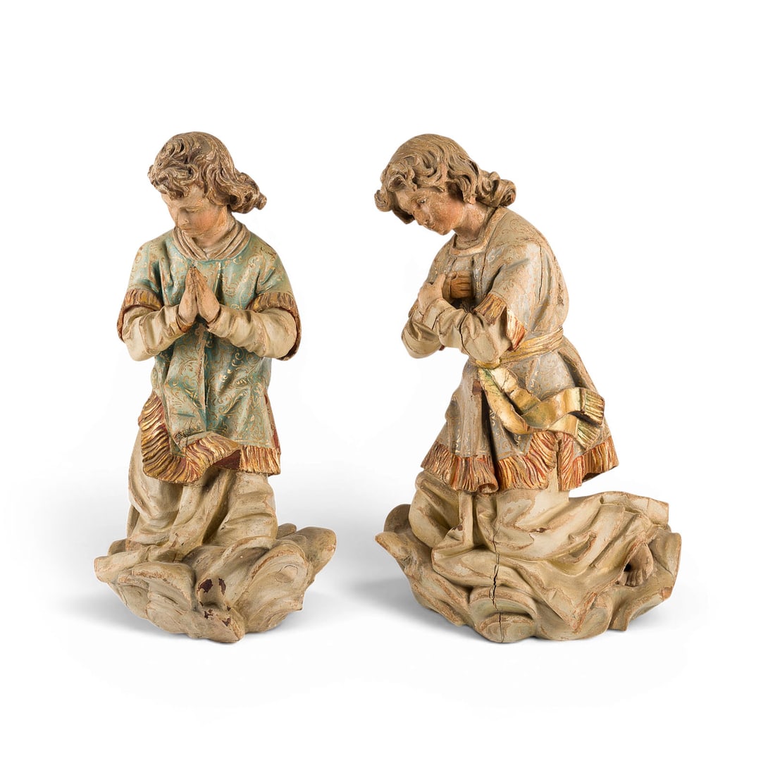 | PAAR ANBETUNGSENGEL: PAIR OF ADORING ANGELS German, 18th century Wood, carved in the round, polychromed and gilded. H. 46/47, W. 30/28, D. 19/20 cm. Two kneeling angels with hands clasped and crossed, wearing flowing robe