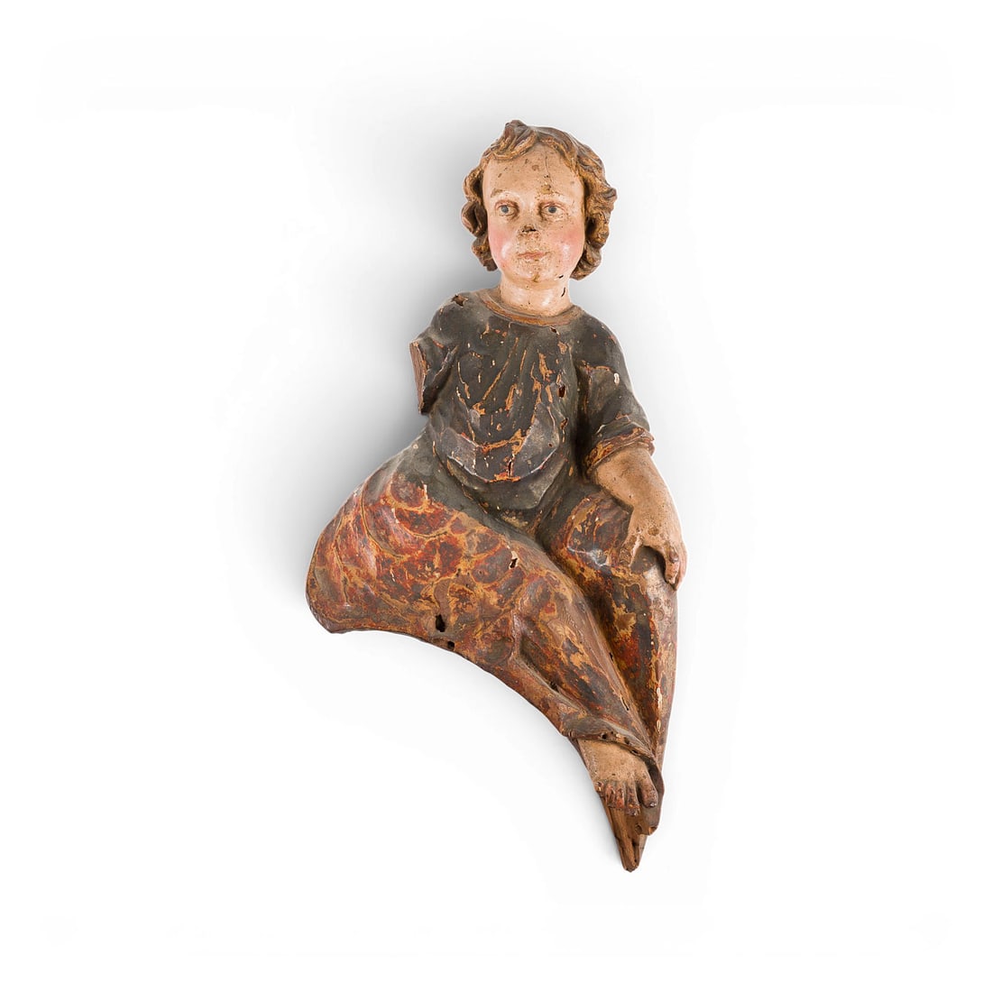 | SCHWEBENDER PUTTO: FLOATING PUTTO Southern Germany or Austria, 17th century Linden wood, carved in the round, polychromed and gilded. H. 51.5, W. 26, D. 9 cm; weight approx. 1.44 kg. Fragmentary figure of a floating ang