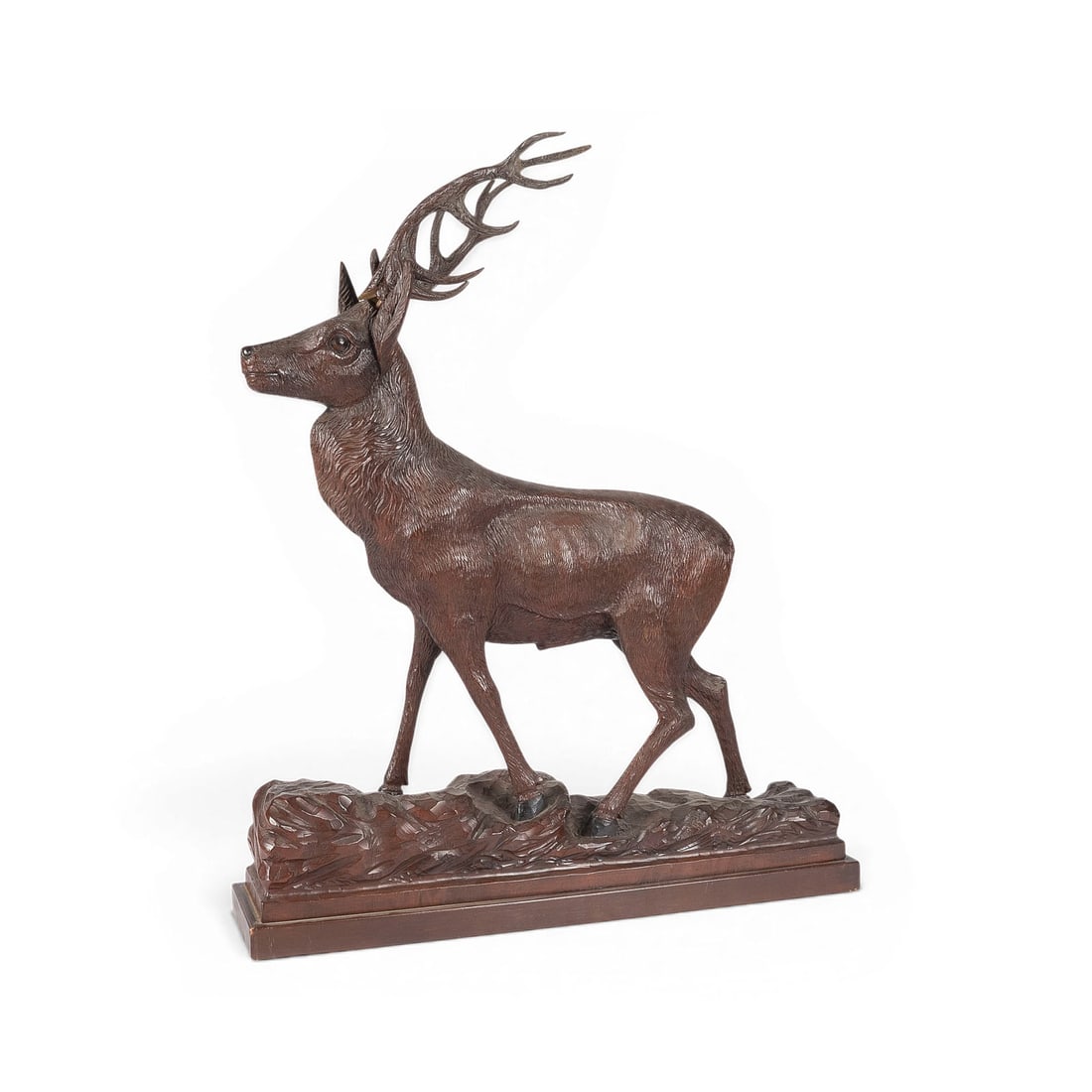 | SCHREITENDER HIRSCH: STRIDING STAG Brienz, Switzerland, late 19th century. Wood, finely carved and stained. H. 57, W. 48, D. 30 cm. A high-quality, naturalistic depiction of a standing twelve-point stag in the style of th