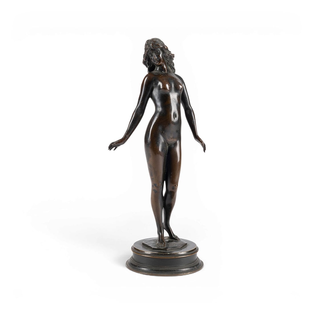 FRANZ IFFLAND | STEHENDER FRAUENAKT: FRANZ IFFLAND 1862 Berlin - 1935 Berlin STANDING FEMALE NUDE Bronze, dark patina, on a round plinth. H. 29, W. 12, D. 8.5 cm; weight approx. 1.22 kg. Inscribed 'F. Iffland' on the front of the plinth.