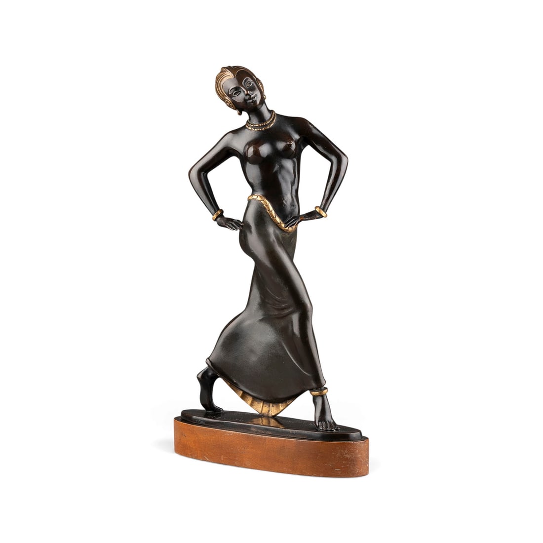 FRITZ PAUL ZIMMER | ART DECO TAeNZERIN: FRITZ PAUL ZIMMER 1895 (?) - 1975 Atlanta/ Georgia ART DECO DANCER Bronze, brown patina, partly painted gold, on an oval plinth and base (h. 4 cm). Overall h. 44.5, w. 27, d. 9 cm, weight approx. 4 kg