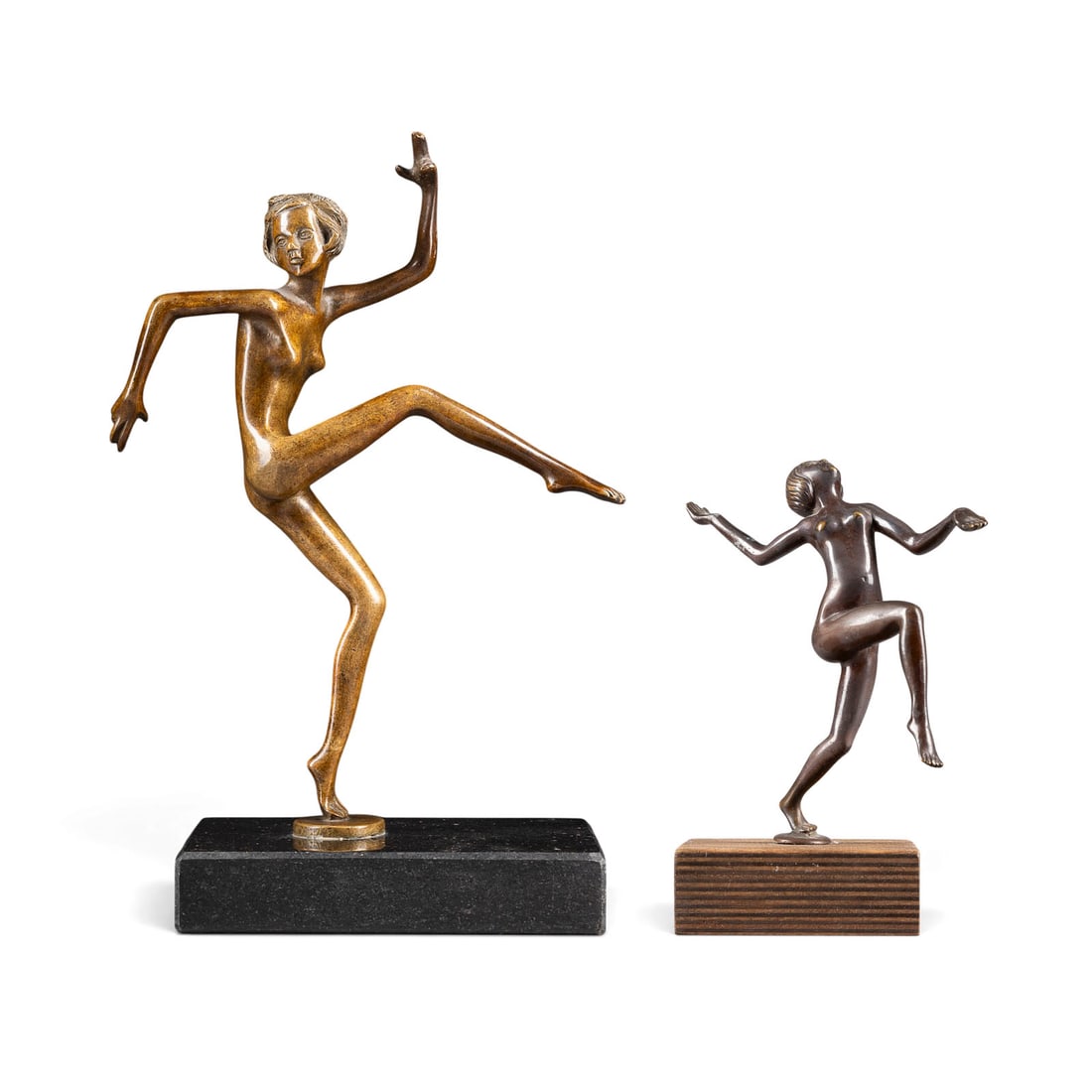 UNBEKANNTER BILDPLASTIKER | ZWEI TAeNZERINNEN: UNKNOWN SCULPTOR Active early 20th century TWO DANCERS Bronze, light and dark patina, each on a base. H. 30/17, W. 20/13, D. 13.5/8 cm. Areas of rubbing and minor nicks; loss of patina.UNBEKANNTER BIL