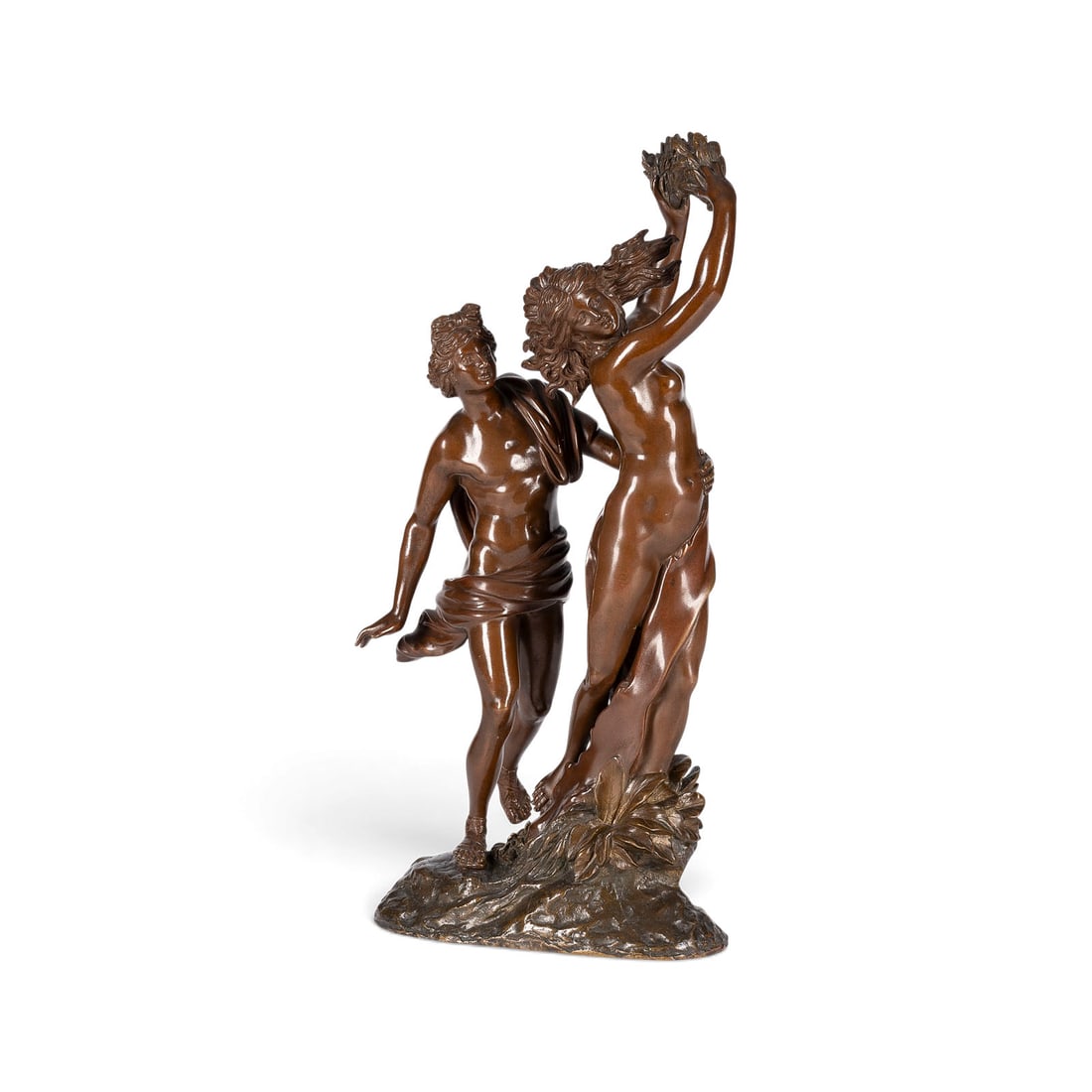 GIAN LORENZO BERNINI | 'APOLLO UND DAPHNE': GIAN LORENZO BERNINI 1598 Naples - 1680 Rome (After) 'APOLLO AND DAPHNE' Italy, c. 1900 Bronze, brown patina, on a naturalistic plinth. H. 36, W. 19.5, D. 11.5 cm; weight approx. 3.85 kg. Unsigned. A 