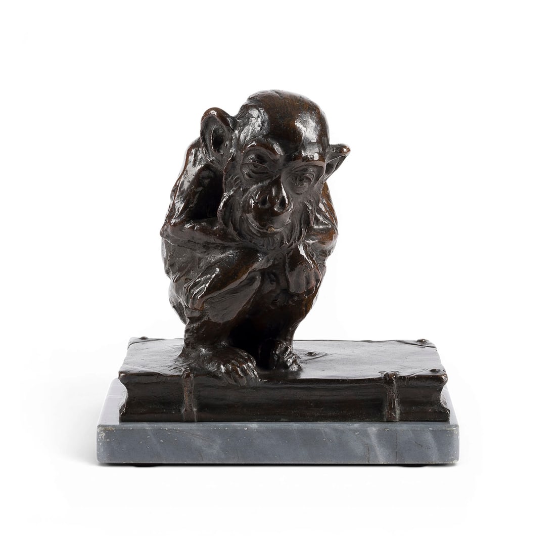 MARTIN MEYER-PYRITZ | 'RAUCHENDER AFFE AUF BUCH': MARTIN MEYER-PYRITZ 1870 Pyritz - 1942 Berlin 'SMOKING MONKEY ON A BOOK' Bronze, dark patina, mounted on a rectangular plinth shaped like a book and a marble base (H. 2 cm). Total H. 17, W. 16, D.