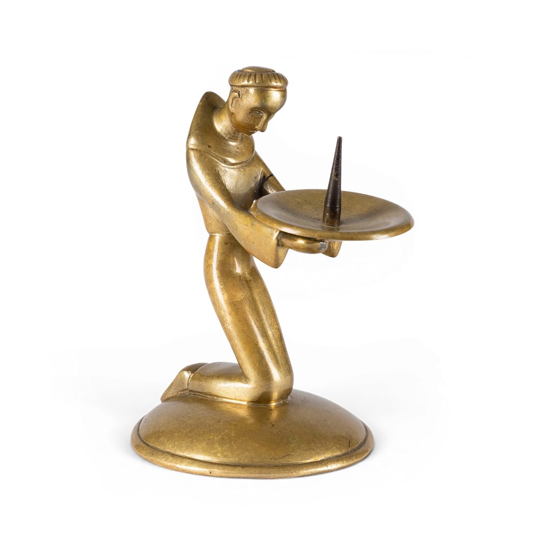 ALBERT GUSTAV BUNGE | FIGUeRLICHER ART DECO KERZENLEUCHTER 'KNIENDER MOeNCH': ALBERT GUSTAV BUNGE 1893 Rathenow - 1967 Salzburg FIGURAL ART DECO CANDLEHOLDER 'KNEELING MONK' Brass with gold-toned patina. H. 11, W. 7, D. 9 cm; weight approx. 0.36 kg. Unsigned; likely based on a 