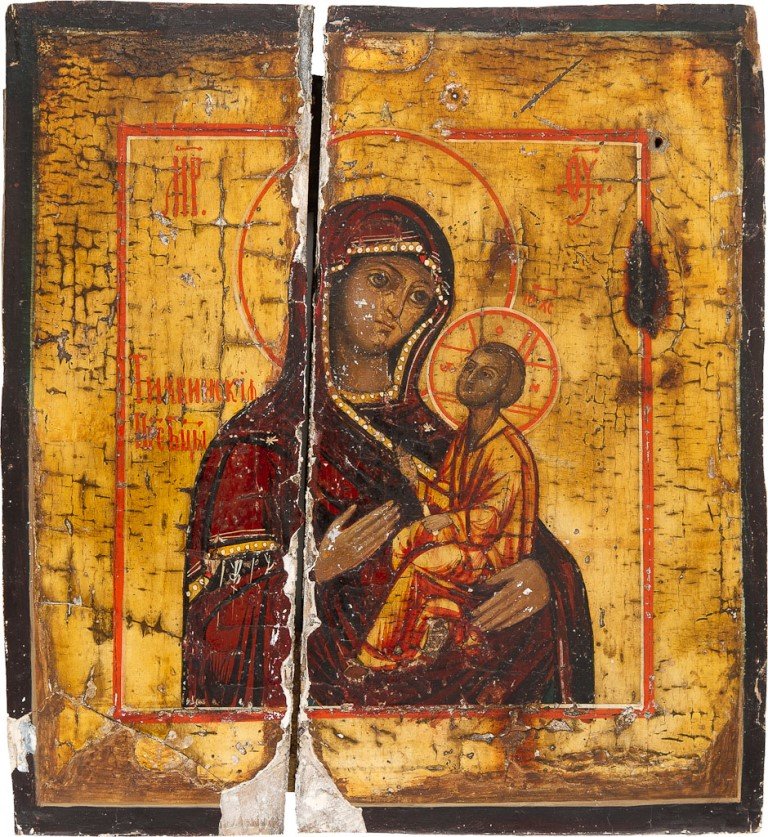 GOTTESMUTTER VON TICHWIN: GOTTESMUTTER VON TICHWIN Holzbrett, Tempera auf Kreide- und Goldgrund. Stark besch., 23 cm x 21,5 cm. Russland, 19. Jh. MOTHER OF GOD OF TICHVIN Wood, tempera on gesso and gold ground. Intenselly dama