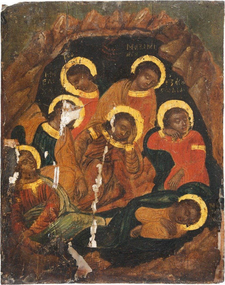 SIEBEN SCHLÄFER VON EPHESUS: SIEBEN SCHLÄFER VON EPHESUS Kleines Holzbrett. Tempera auf Kreidegrund, Nimben vergoldet. Stark besch., 19 cm x 15 cm. Griechenland, 19. Jh. SEVEN SLEEPERS OF EPHESOS Wood, tempera on gesso ground, h