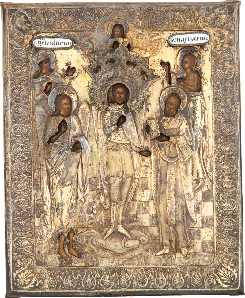 PATRONATSIKONE MIT VERMEIL-OKLAD: A SELECTION OF FAVOURITE SAINTS WITH A SILVER-GILT OKLAD Russian, early 19th century (icon), St. Petersburg, Johannes Tölkeri, 1839 (oklad) Tempera on wood panel. Archangel Michael in a cuirass and c