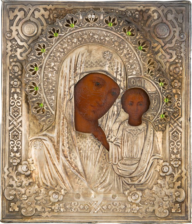 GOTTESMUTTER VON KASAN (KASANSKAJA) MIT SILBEROKLAD: THE KAZANSKAYA MOTHER OF GOD WITH SILVER-GILT OKLAD Russian, 3rd quarter 19th century (icon), St. Petersburg, Agafon Gudkov, 1879 (oklad) Oil on wood panel. Overlaid with a chased and embossed silver-