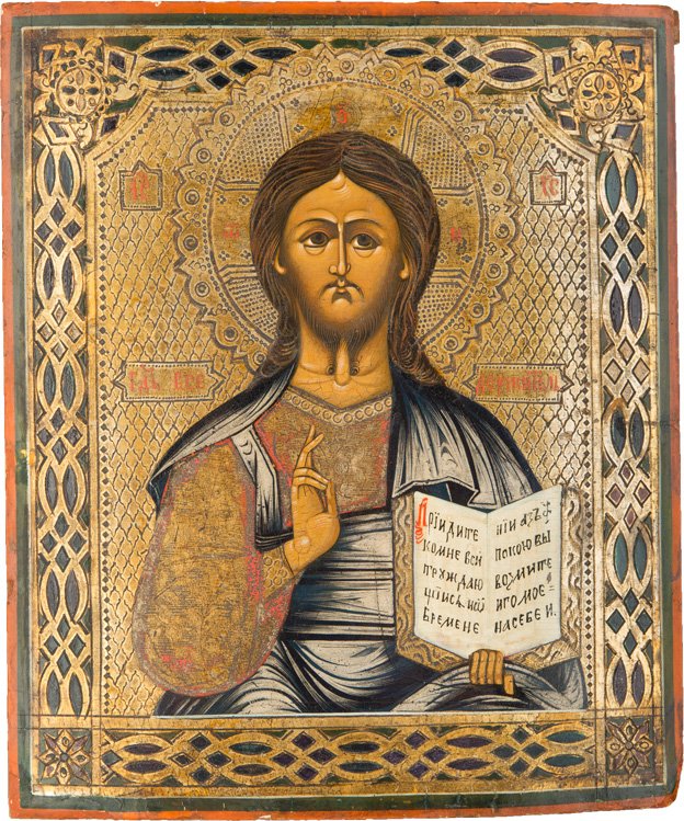 CHRISTUS PANTOKRATOR: CHRIST PANTOKRATOR Russian, 19th century Tempera on wood panel. The background is made of silver, covered by a golden lacquer. The golden background ornamentally punched, the border emulating contempo