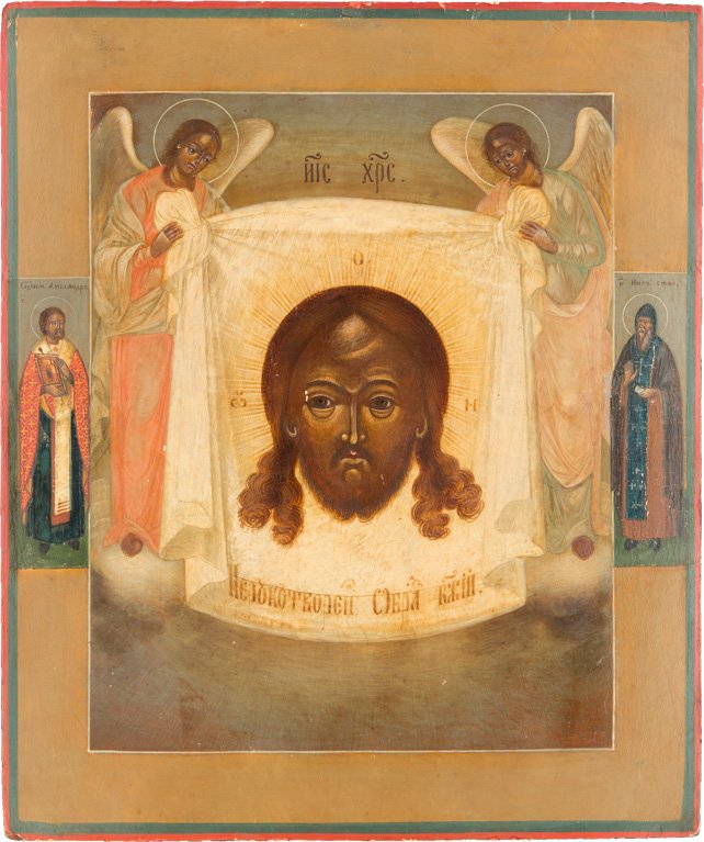 MANDYLION: THE MANDYLION Russian, circa 1900 Tempera on wood panel. The face of Christ imprinted on a cloth, the latter supported by two angels. Two selected saints on the borders. Minimal restored. 31 x 26 cm. 