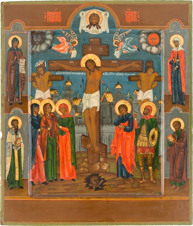 FEINE IKONE MIT DER KREUZIGUNG CHRISTI: A FINE ICON OF THE CRUCIFIXION Russian, 19th century Egg tempera on wood panel with kovcheg. The Crucifix on the summit of Golgotha, the bones of Adam in the cave below, the Mother of God, Mary Magdal