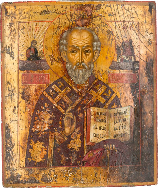 HEILIGER NIKOLAUS VON MYRA: ST. NICHOLAS OF MYRA Russian, Vetka, 19th century Tempera on wood panel. The background made of silver, covered by a golden lacquer. Traditionally painted. Paint blisterings, wearings. 31.1 x 26.5 cm.
