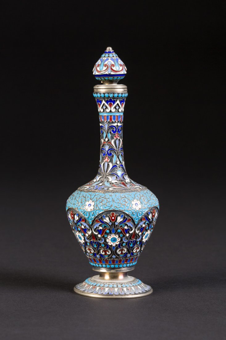 CLOISONNÃ‰-EMAIL-FLAKON MIT SToPSEL: A SILVER-GILT AND CLOISONNÃ‰ ENAMEL FLASK WITH STOPPER Russian, Moscow, Nikolai Vasilevitch Alekseev, 1894 Of baluster shape. The surface decorated with stylized flowers and scrolling foliage on st