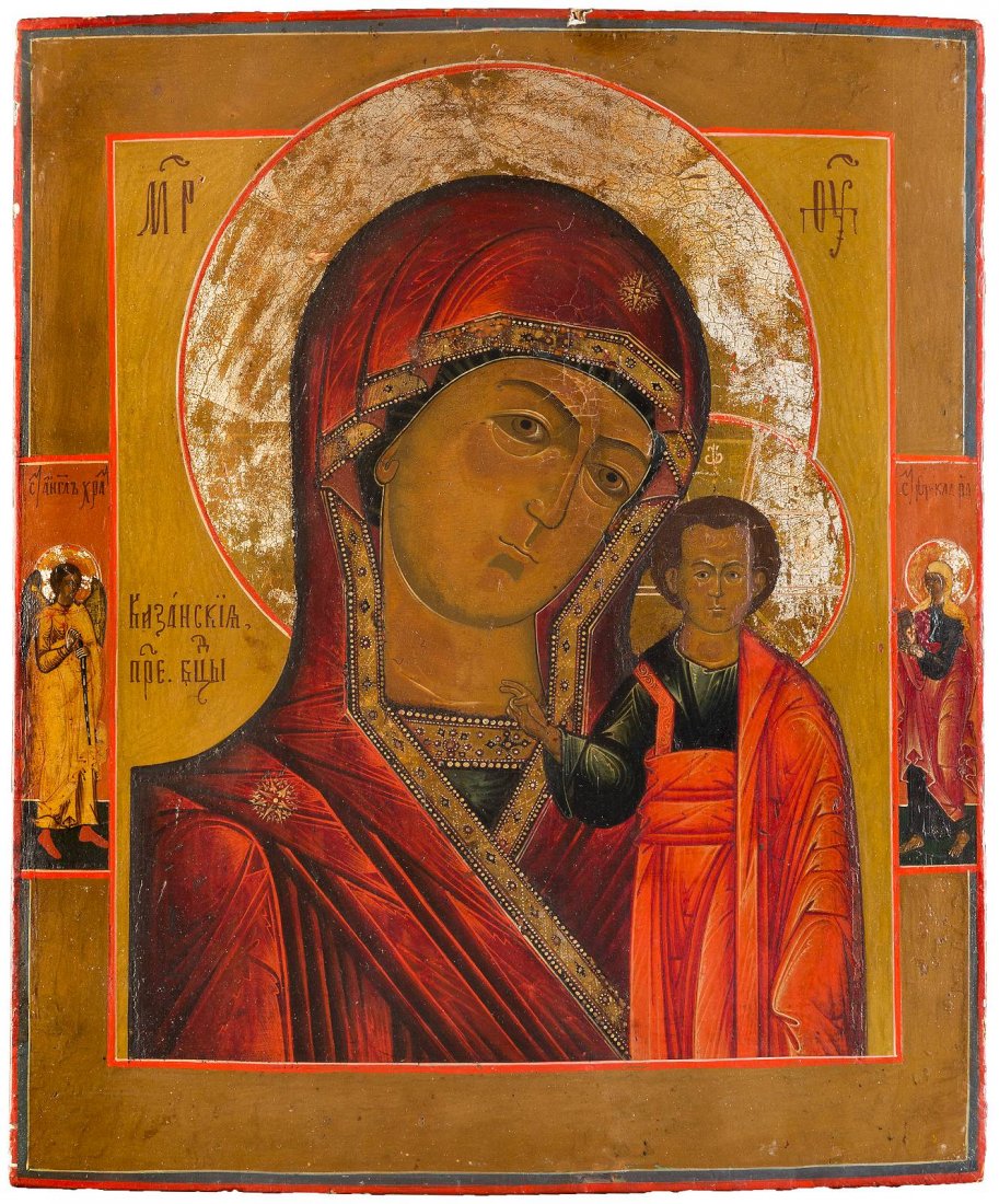 A LARGE ICON SHOWING THE KAZANSKAYA MOTHER OF GOD: A LARGE ICON SHOWING THE KAZANSKAYA MOTHER OF GOD Russian, 2nd half 19th century Tempera on wood panel. Painted traditionally using predominantly reds, the haloes made of silver, covered by a golden l