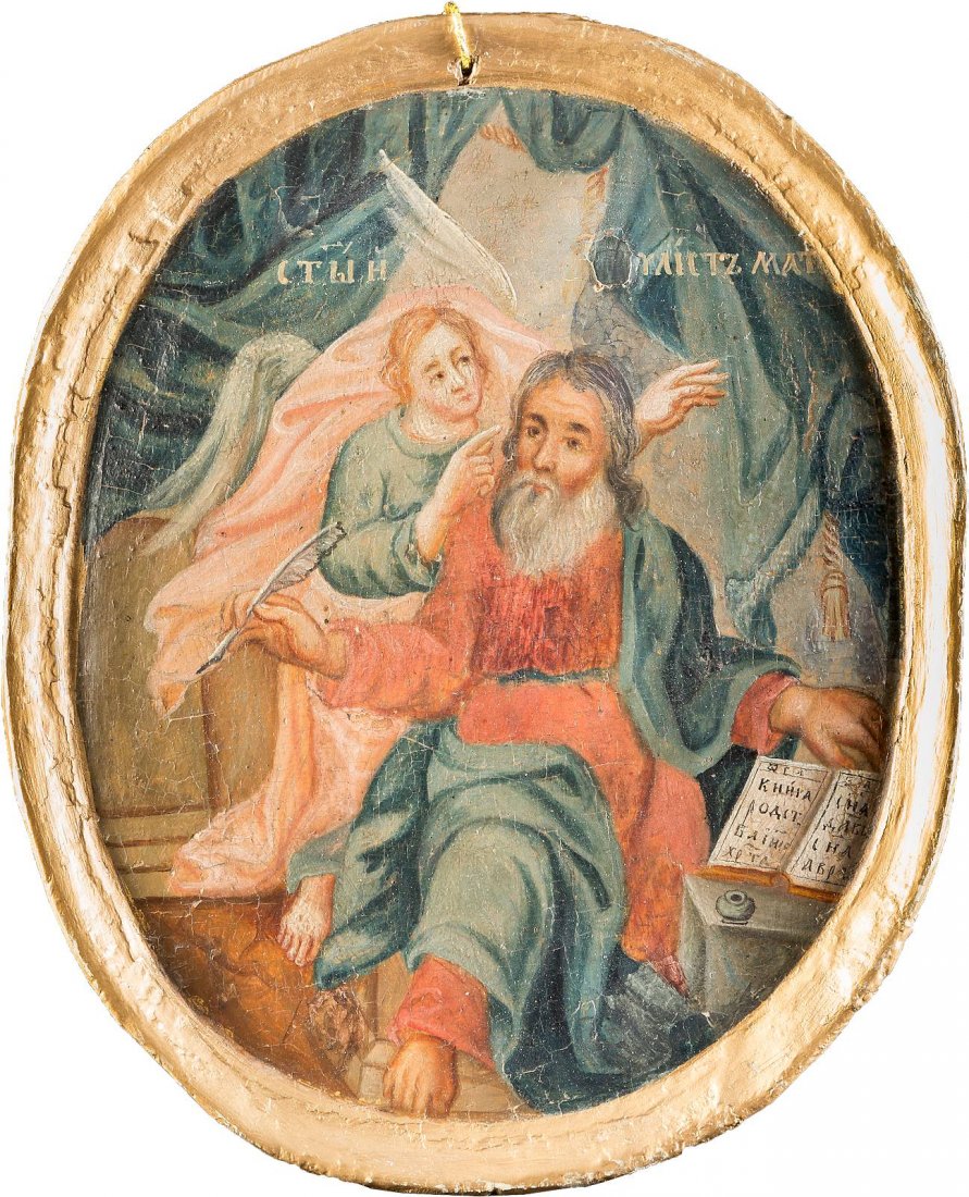 THE EVANGELIST MATTHEW Russian, 2nd half 18th century: THE EVANGELIST MATTHEW Russian, 2nd half 18th century Tempera on wood panel. Painted within an oval reserve and with integral carved gilt frame, here Matthew is shown presentating his Gospels and in t