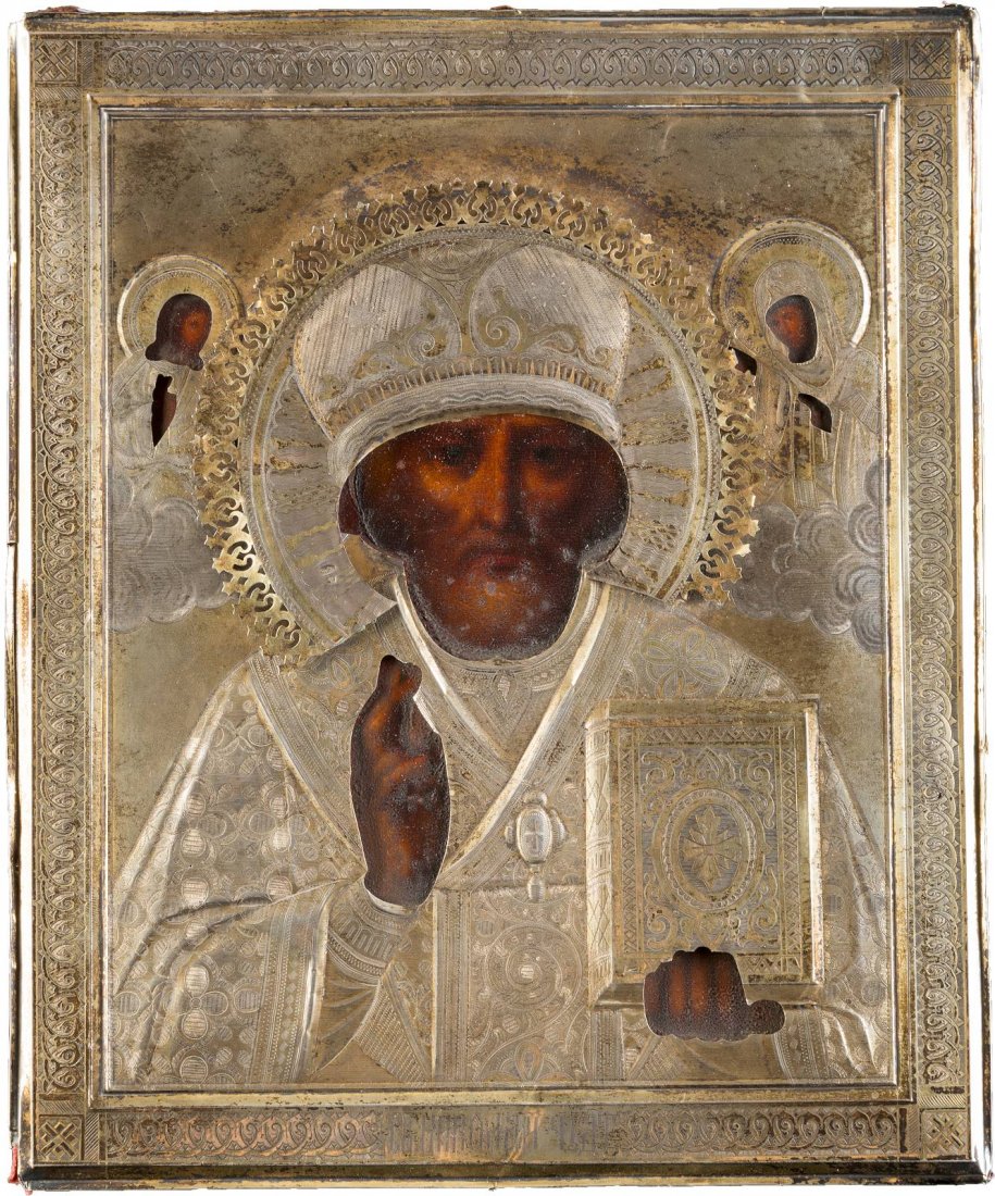 ST. NICHOLAS THE MIRACLE WORKER WITH SILVER OKLAD: ST. NICHOLAS THE MIRACLE WORKER WITH SILVER OKLAD Russian, late 19th century (icon), Moscow, 1896-1908 (oklad) Oil on wood panel with velvet backing. The gilded silver oklad and parcel gilt robes chas