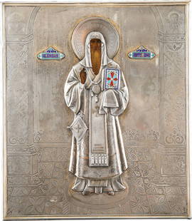 ST. ALEXEI, METROPOLITAN OF MOSCOW WITH SILVER AND: ST. ALEXEI, METROPOLITAN OF MOSCOW WITH SILVER AND ENAMEL OKLAD Russian, circa 1900 (icon), probably Moscow, 1908-1917 (oklad) Oil in wood panel, with velvet backing. The saint shown frontally full le