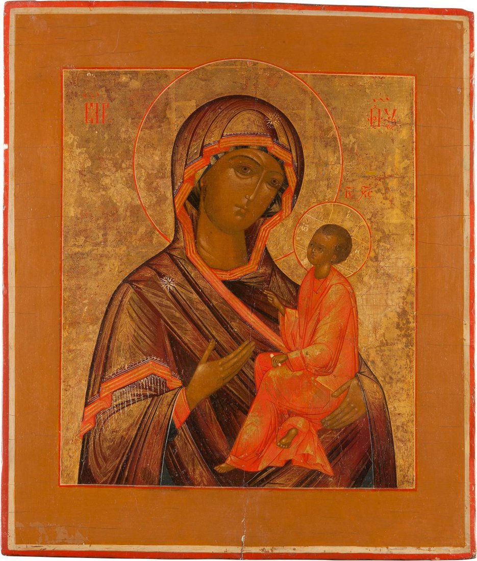 AN ICON OF THE TIKHVINSKAYA MOTHER OF GOD Russian, 19th: AN ICON OF THE TIKHVINSKAYA MOTHER OF GOD Russian, 19th century Tempera on wood panel. Christ seated on his Mother's forearm, the Mother of God directing the viewer's gaze to her son with her hand. Th