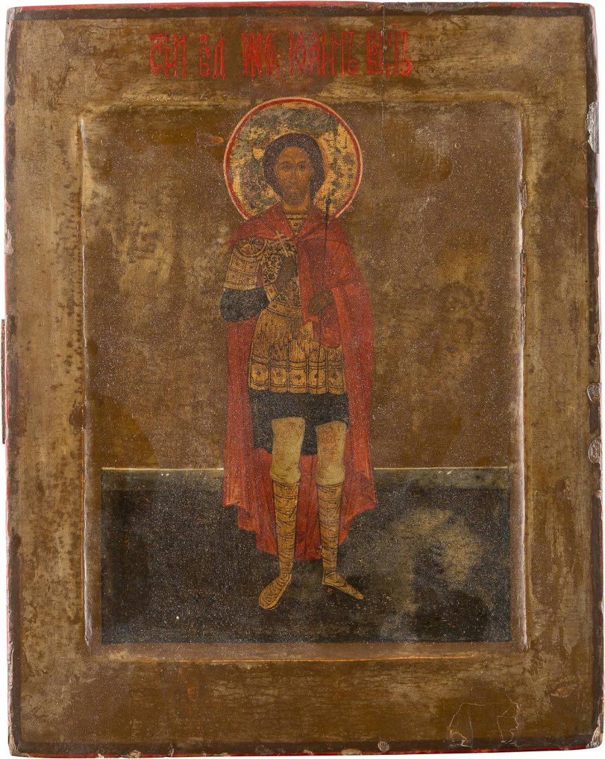 ST. JOHN THE WARRIOR Central Russian, 2nd half 19th: ST. JOHN THE WARRIOR Central Russian, 2nd half 19th century Tempera on wood panel with kovcheg. The saint represented frontal in full-length. Holding a cross and a lance in his hands. Minimally restor