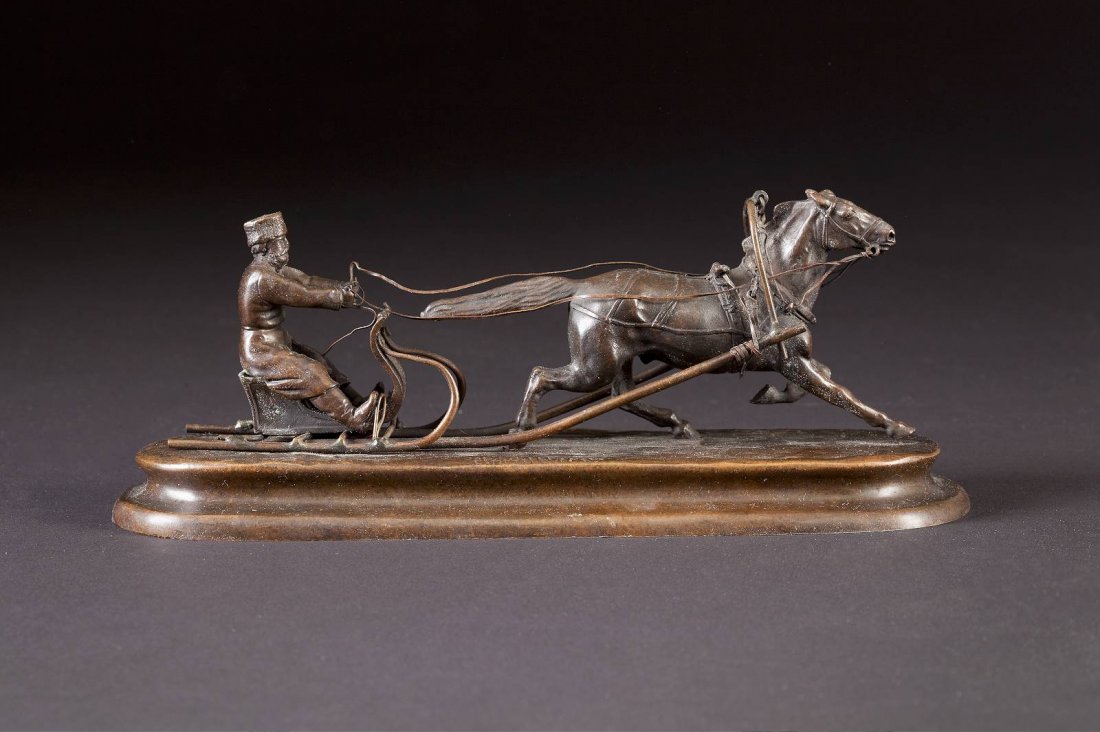 VASILII GRACHEV 1831 Berestyanki - 1905 St. Petersburg: VASILII GRACHEV 1831 Berestyanki - 1905 St. Petersburg DIE SCHLITTENFAHRT A BRONZE GROUP OF A HORSE-DRAWN SLEIGH Russland, St. Petersburg, Ende 19. Jh. On an oblong naturalistic base, cast as a man ri
