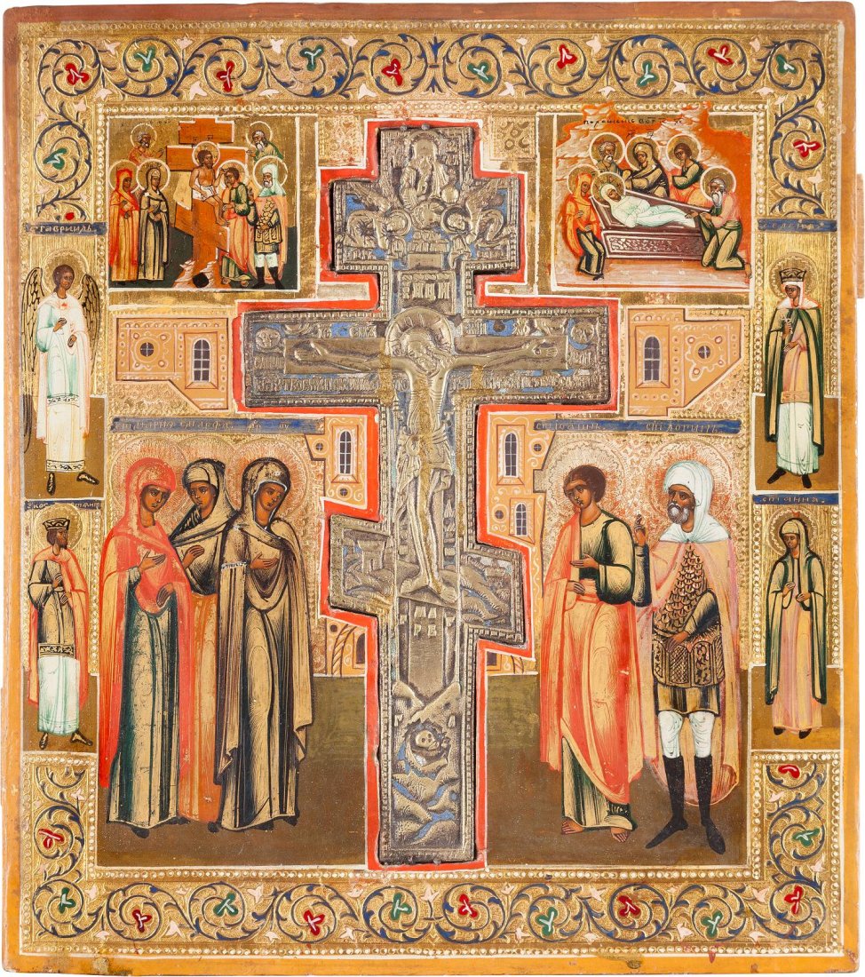 AN ICON SHOWING THE CRUCIFIXION, THE DESCENT FROM THE: AN ICON SHOWING THE CRUCIFIXION, THE DESCENT FROM THE CROSS AND THE ENTOMBMENT Russian, late 19th century Tempera on wood panel. Inset with a brass and enamel crucifix. The border emulating contempora