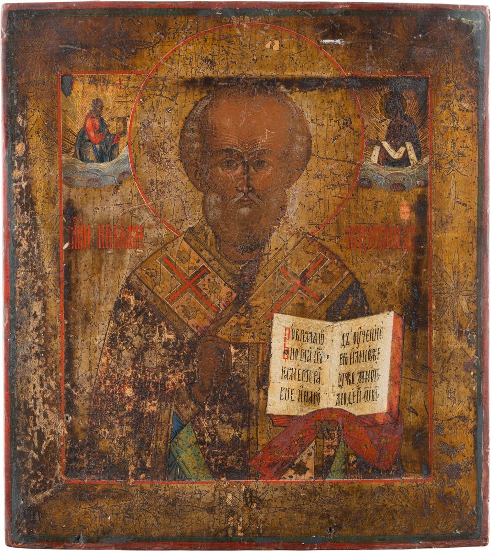 AN ICON SHOWING ST. NICHOLAS OF MYRA Russian, Vetka,: AN ICON SHOWING ST. NICHOLAS OF MYRA Russian, Vetka, mid 19th century Tempera on wood panel. The background made of silver, covered by a golden lacquer. Minimally worn. 34.2 x 30 cm. IKONE MIT DEM HEI