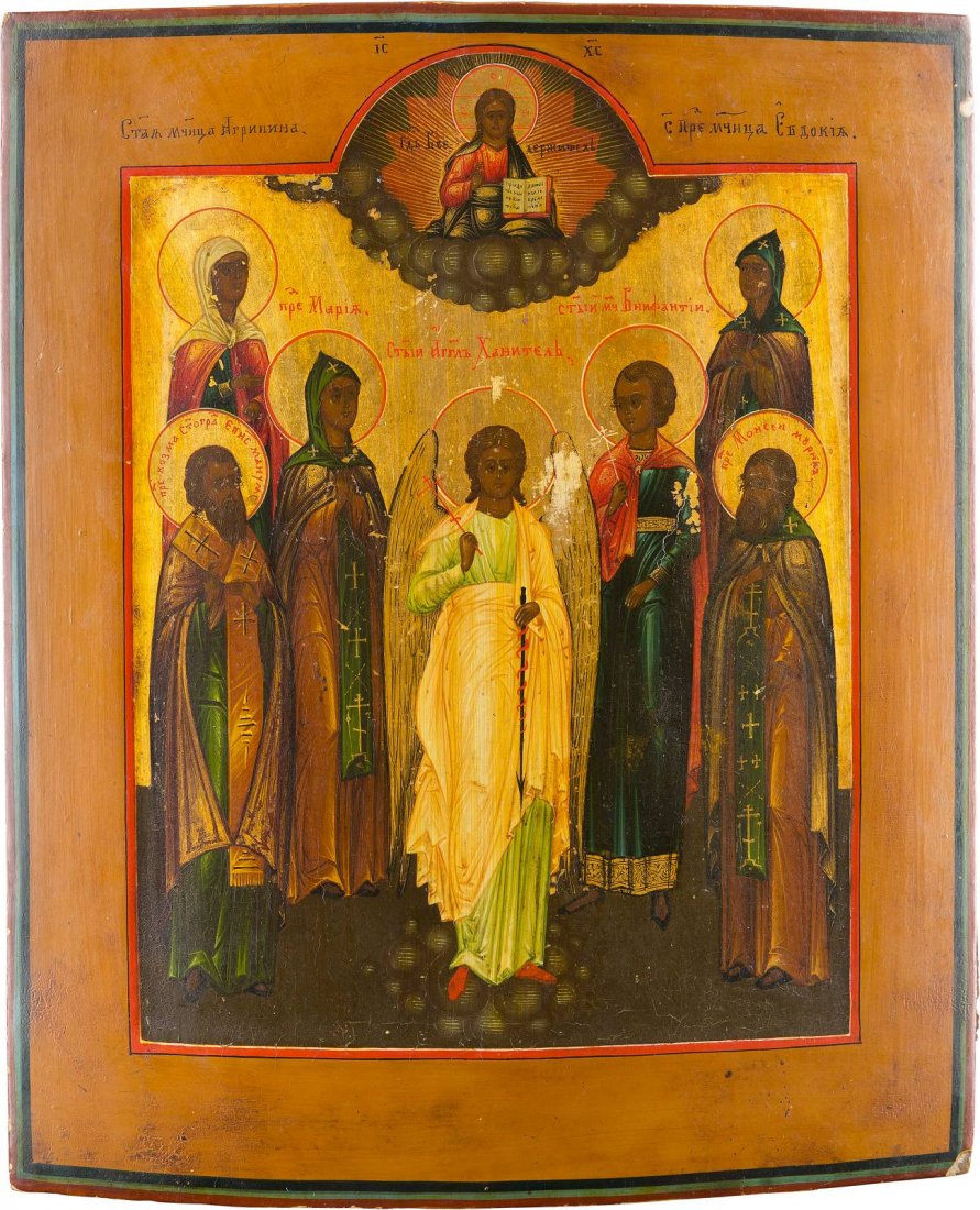 AN ICON SHOWING THE GUARDIAN ANGEL AND SIX FAMILY: AN ICON SHOWING THE GUARDIAN ANGEL AND SIX FAMILY PATRONS Russian, late 19th century Tempera on wood panel with kovcheg. Executed on a gold ground. Minimally worn. 31.3 x 26.5 cm. IKONE MIT DEM SCHUTZ