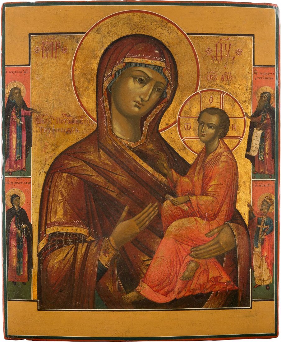 AN ICON SHOWING THE TIKHVINSKAYA MOTHER OF GOD Russian,: AN ICON SHOWING THE TIKHVINSKAYA MOTHER OF GOD Russian, 19th century Tempera on wood panel. Executed on a gold ground. Four selected saints on the borders. Minimally restored. 34 x 28 cm. IKONE MIT DE